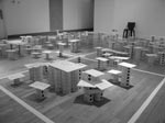 photo of paper models in the shape of towers