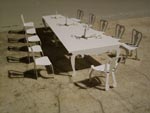 photo of miniature modelof chairs and table
