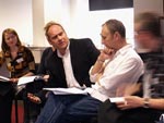 people holding discussions in a workshop