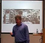 photo of man giving a presentation