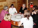 photo of people sitting round a table